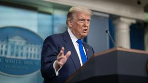 Embattled Fed governor sues Trump over 'illegal' firing