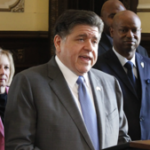 Pritzker signs budget sending millions to NGOs