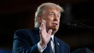 Trump defends tariffs in Michigan as new legal challenge advances
